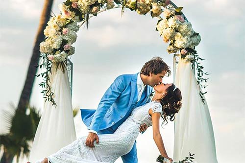 Couple kissing on destination wedding